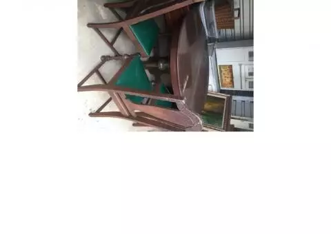 Round oak dining table with 5 chairs